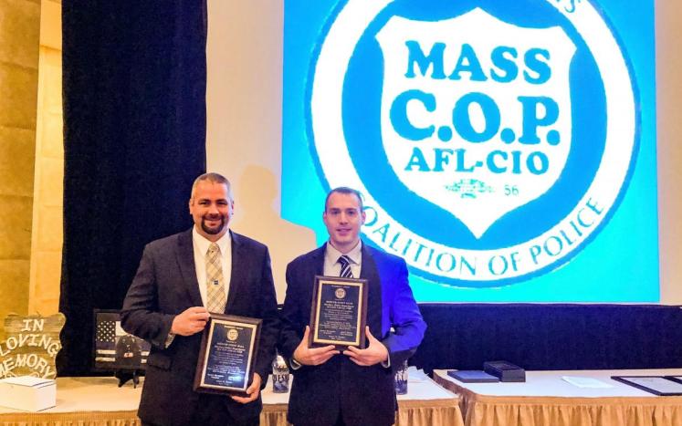Officers Kane and Hall receive the Mass C.O.P. Presidents award